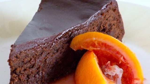 Image of Almost Flourless Dark Chocolate Blood Orange Olive Oil Cake with Vanilla Bean Candied Kumquats