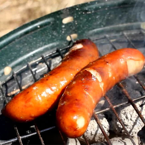Image of Heat the Buffalo Hot Dogs in a skillet or on the grill.
