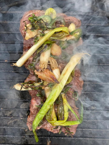 Image of Transfer to a warm platter and liberally sauce with the Spring Inspired Chimichurri (recipe to follow)