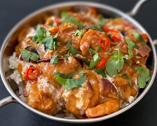 Image of Creamy shrimp and aubergine curry with cinnamon, clove and coriander 
