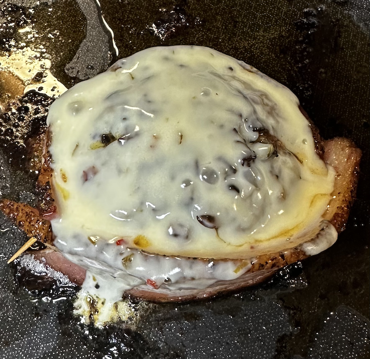 Image of Preheat a skillet over medium heat with 1 tablespoon of butter. Once the skillet is heated, add your hamburger patties and cover. Cook the burgers for approximately 20 minutes for a medium cook. Once they’re almost done, top the patties...