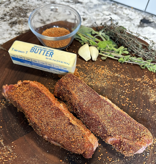 Image of Start by warming up your pan over medium-high heat. You're going to want a good sear on your steaks. Once your pan is hot, add the steaks to the pan and sear both sides. 