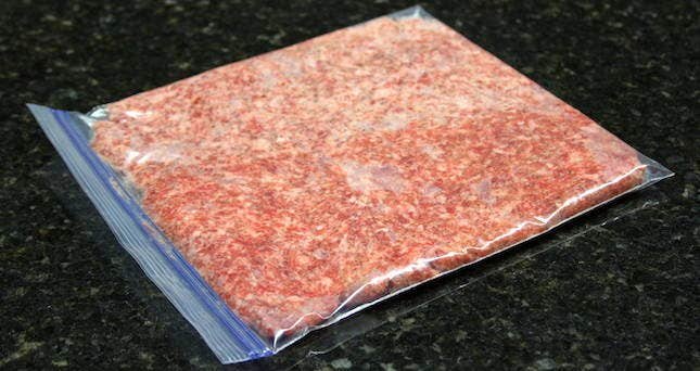 Image of In a one gallon baggie combine both packages of sausage....
