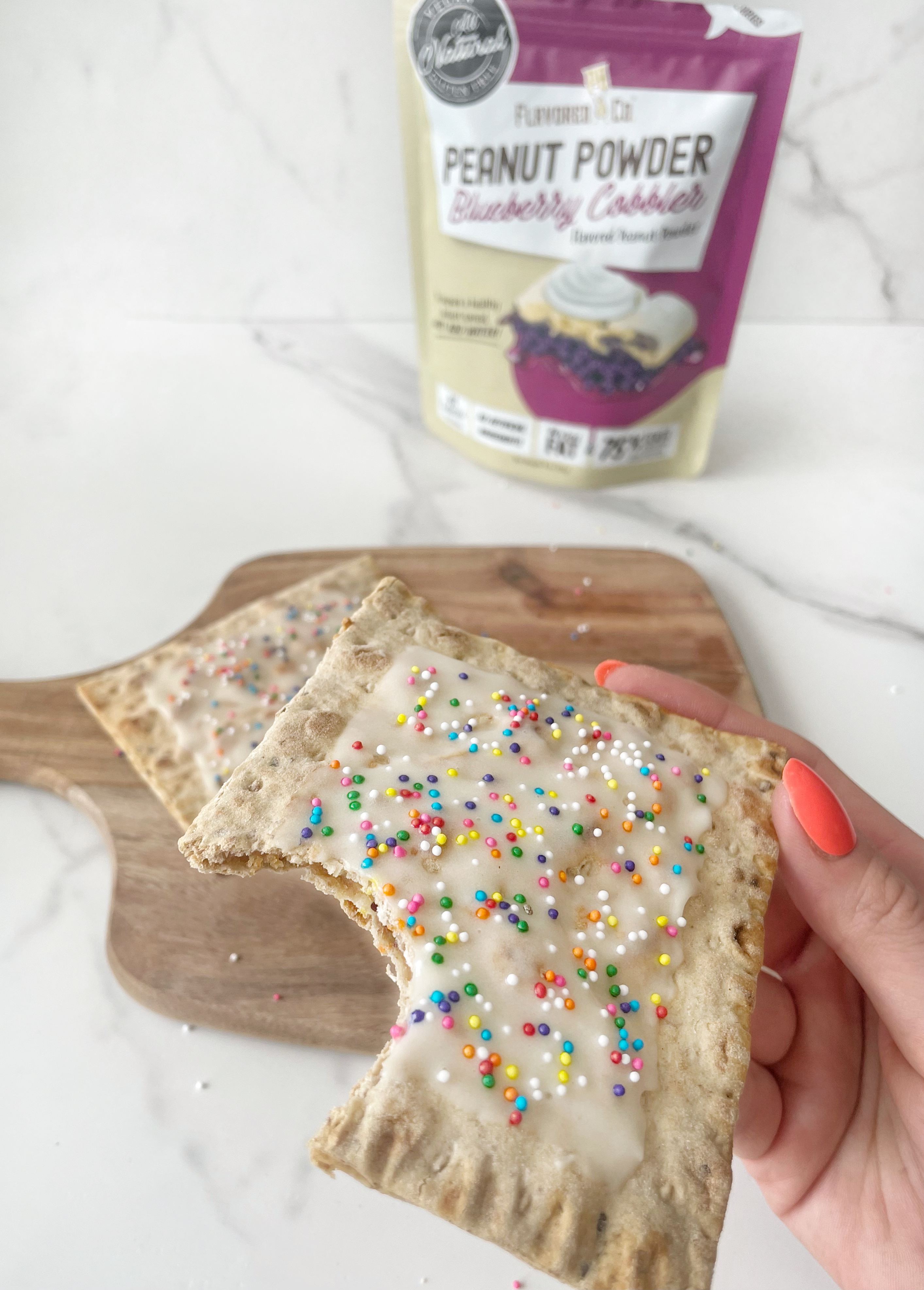 Image of Spread the icing on top of the poptarts, add sprinkles,...
