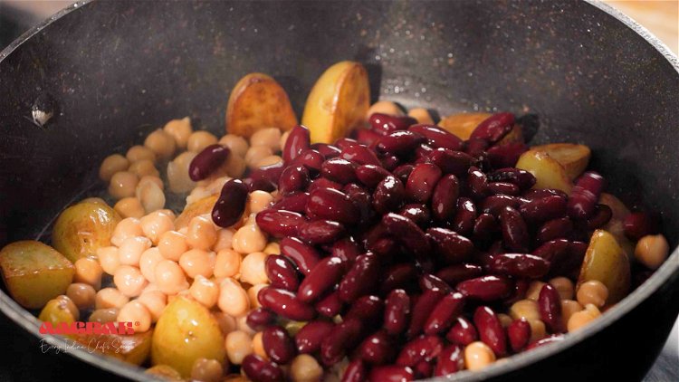 Image of Add the beans and chick peas