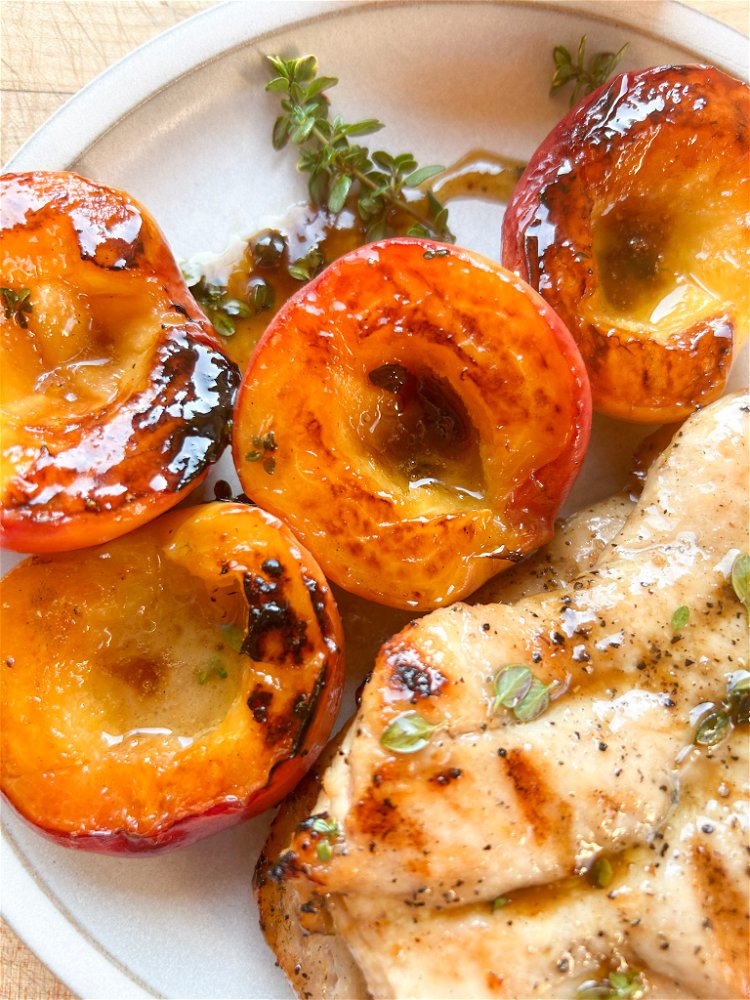 Image of Plate the chicken and peaches and drizzle with remaining honey...