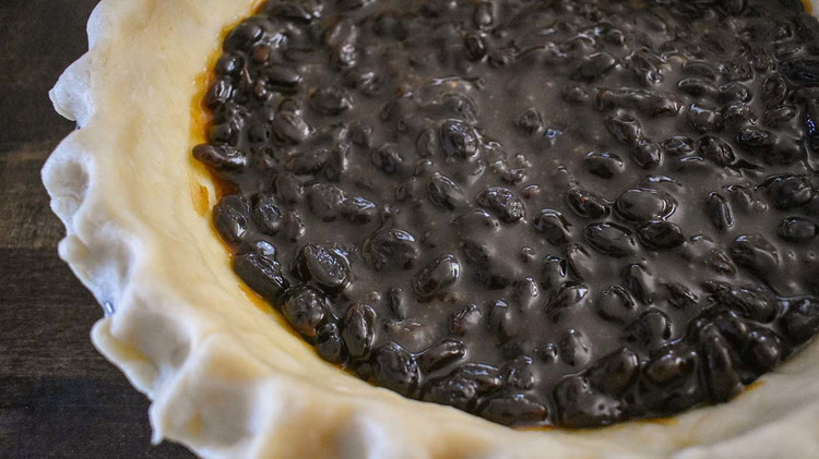 Image of Pour filling into the refrigerated pie plate.