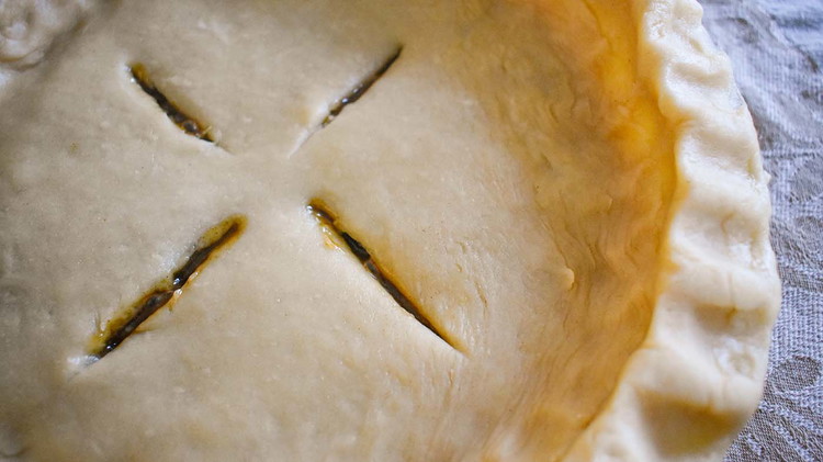 Image of Cover with top crust. Seal edges and cut slits in top crusts.