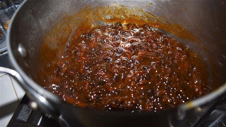 Image of Add to the hot raisin mixture.Cook over medium heat, stirring...