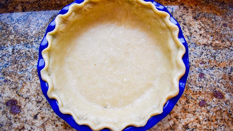 Image of Preheat the oven to 425. Line a 9-inch pie pan...