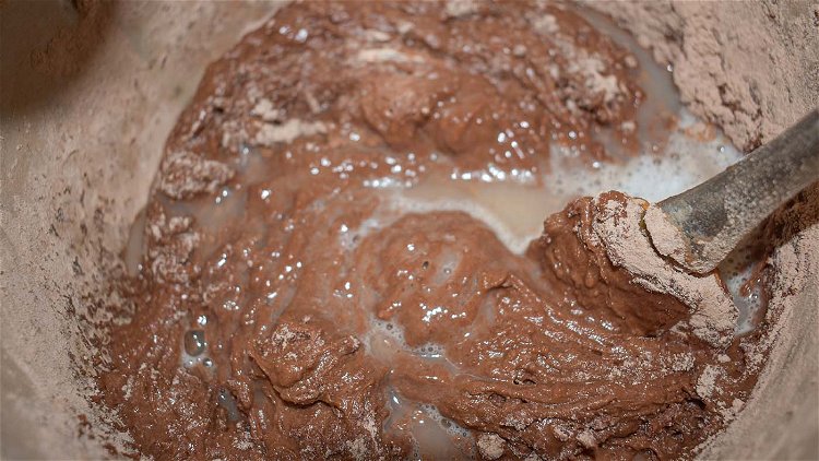 Image of Sift flour, cocoa, and salt. Add alternately with milk.