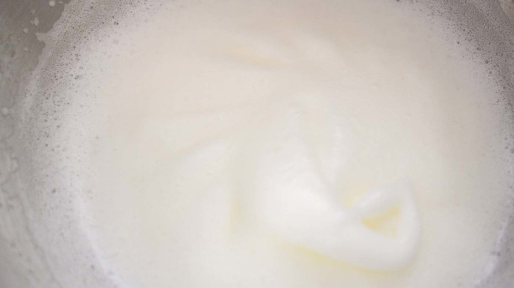 Image of Mix powdered sugar and milk. Combine together egg whites and beat.