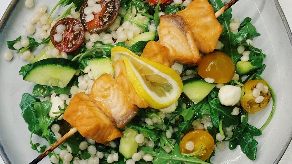 Image of Grilled Salmon Skewers over Mediterranean Couscous Salad