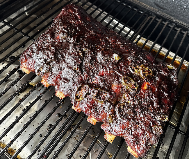 Image of Baste them with your favorite BBQ sauce and smoke for...