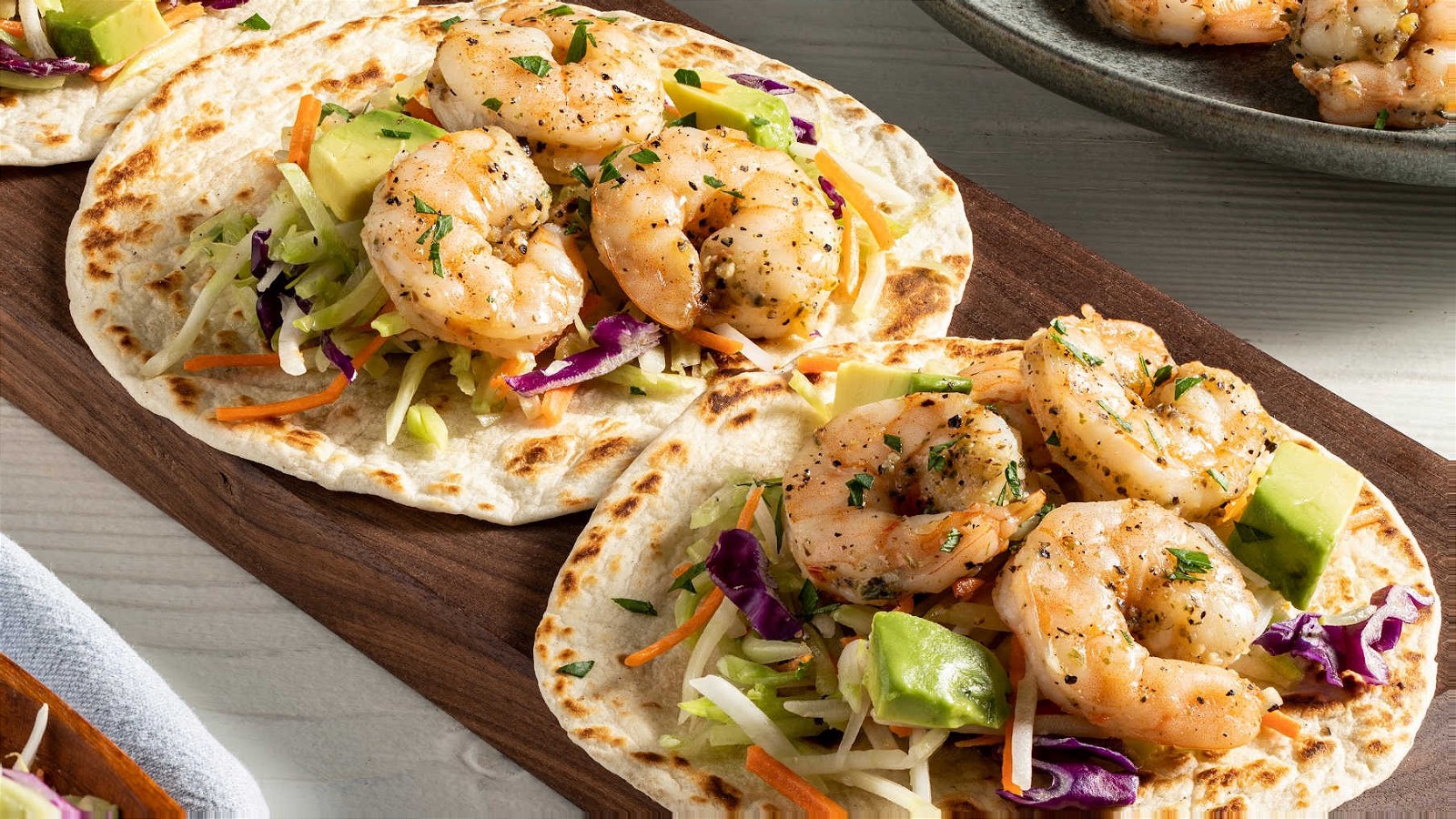 Image of Easy Lemon Pepper Shrimp Tacos with Creamy Slaw