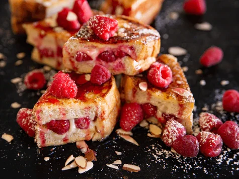 https://images.getrecipekit.com/20230628155747-stuffed-french-toast-752656_520x500.webp?aspect_ratio=4:3&quality=90&