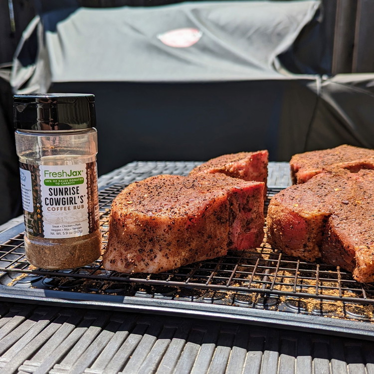 Image of The night before cooking, pat the chops dry with a paper towel and season all sides with Sunrise Cowgirl's Coffee Rub and place on a warming rack on a tray, uncovered in the fridge to dry brine.