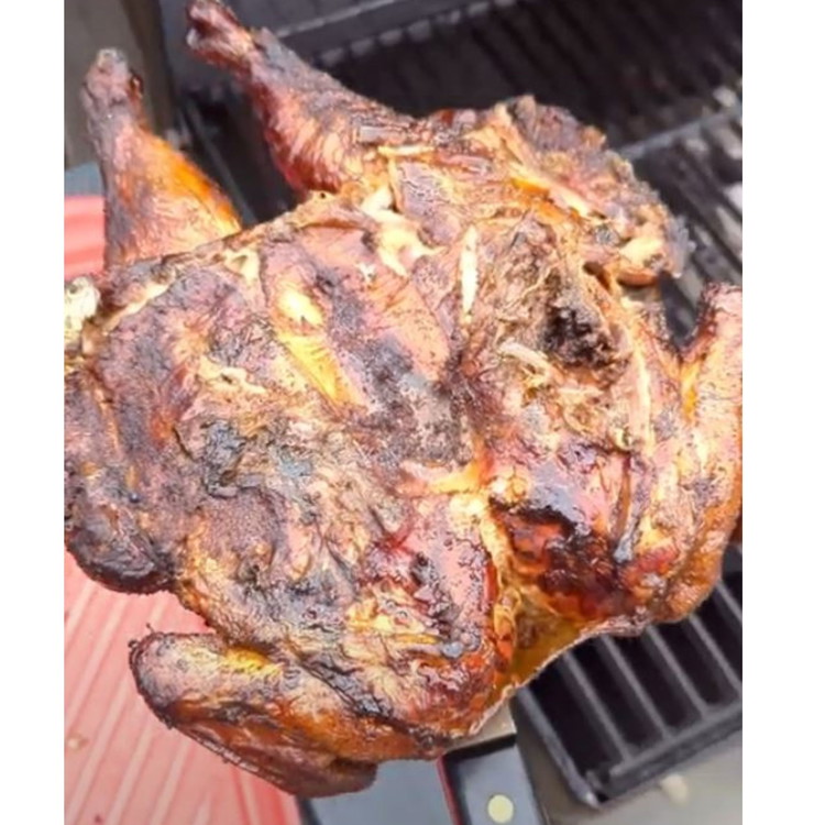 Image of Place the chicken skin side down on the flames for about a minute to get a nice crisp.
