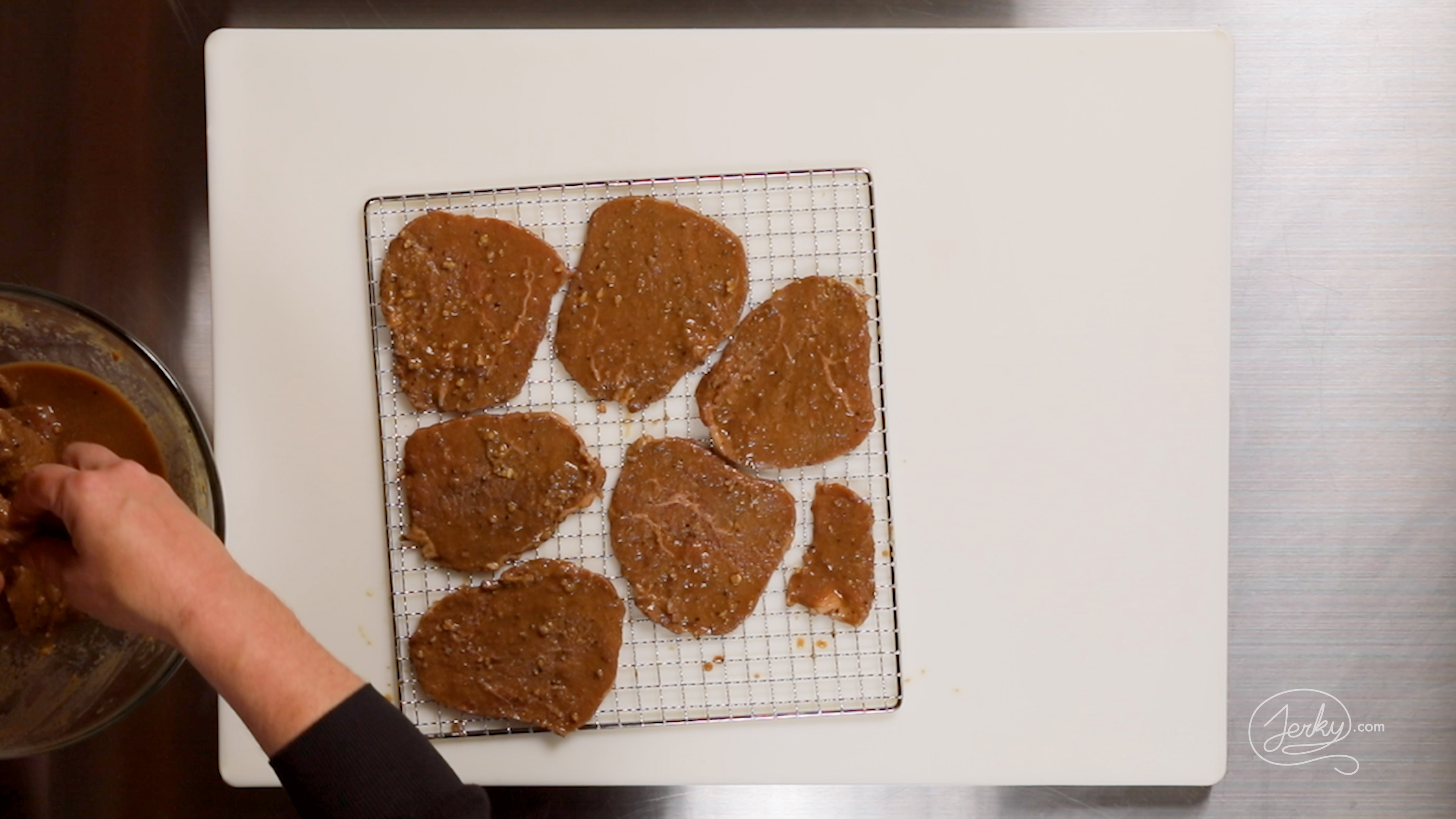 Image of Lay out the meat pieces on your dehydrator or oven...