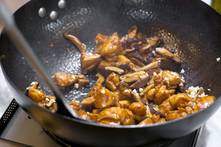 Image of Add the mushroom slices and minced garlic and sauté for a couple of minutes.