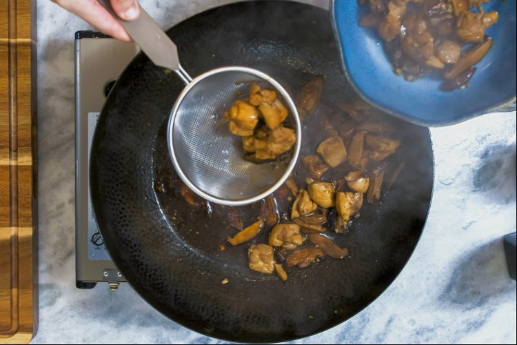 Image of Use a strainer to take the chicken and the mushroom...