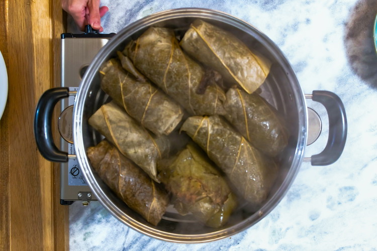 Image of Put all the lo mai gai in a steamer and bring the water to a boil. Steam them over high heat for 30 minutes. The filling and the rice are cooked so the steaming process just lets the Lo Mai...