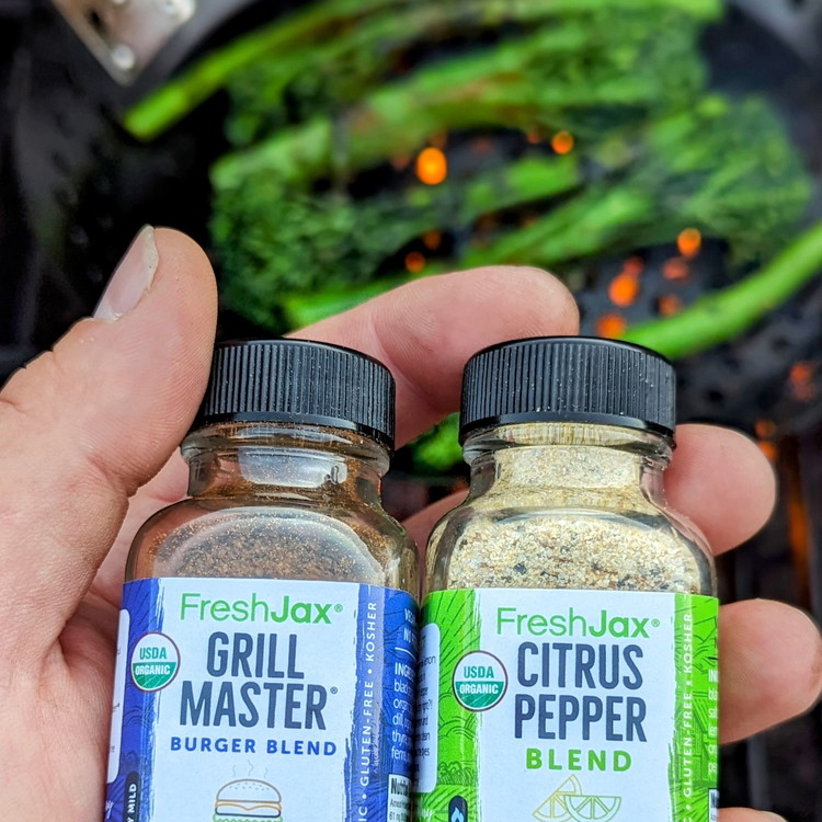 Image of Pat the broccolini dry, then toss in olive oil and both FreshJax seasonings.