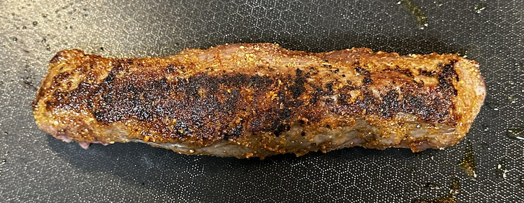 Image of Once your pan is hot, sear all sides of the tenderloin for two minutes each side. Then, put it in the oven for four minutes (for medium rare).