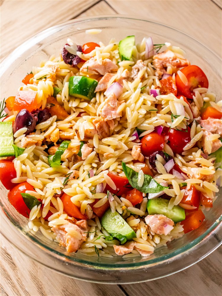 Image of Add cooked salmon and remaining ingredients to bowl with orzo....
