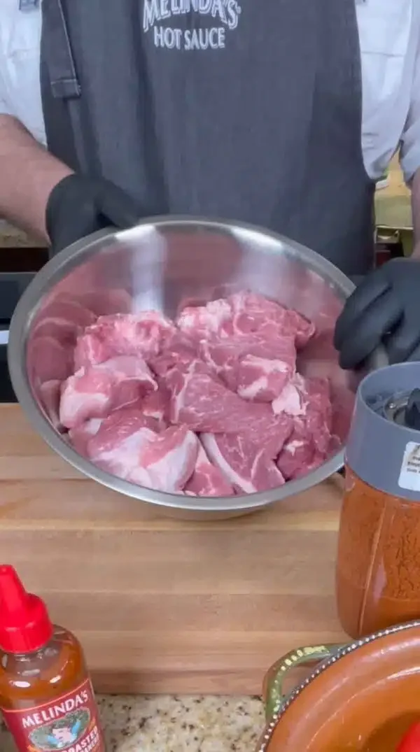 Image of Cut the pork into large chunks (3-4 inch cubes), this...
