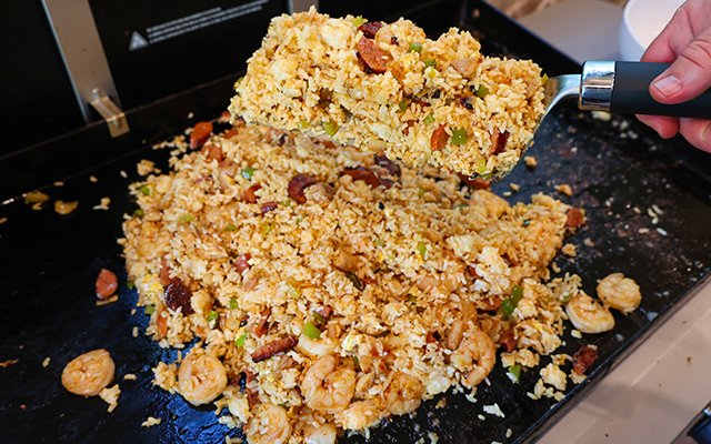 Image of Transfer the fried rice to a serving platter, garnish with...