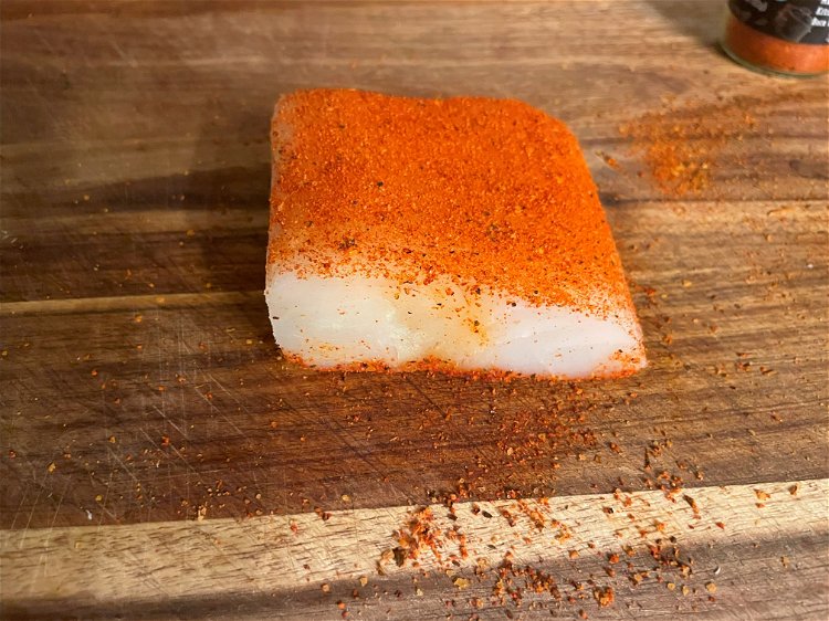 Image of Cover each side of halibut generously with seasoning. Sear both...