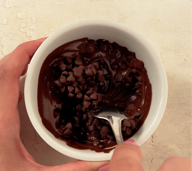 Image of Melt chocolate chips in the microwave in 30 second bursts,...