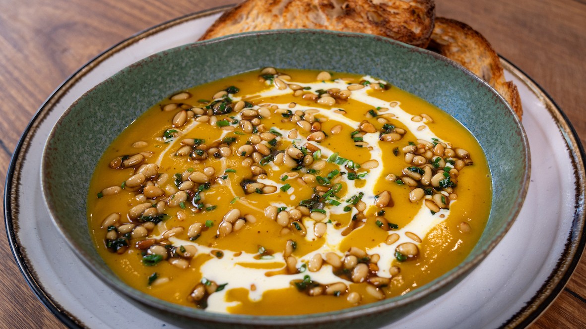 Image of Pumpkin soup with toasted pine nuts