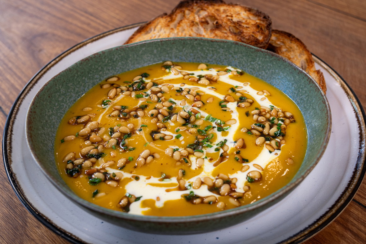 Pumpkin soup with toasted pine nuts