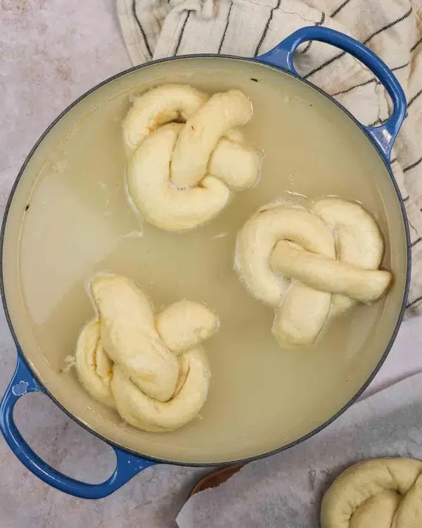 Image of Carefully boil each pretzel for 1 minute (if you can,...