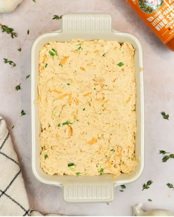Image of Transfer the buffalo chicken dip to a small oven-safe serving...