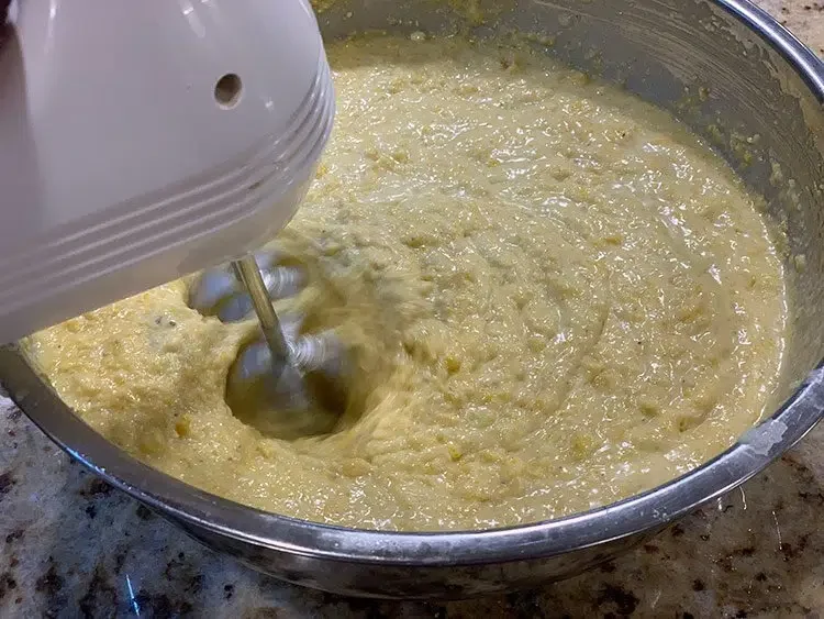 Image of Add 3 cups of corn meal and the melted butter...