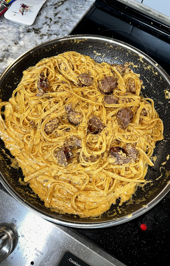 Image of Stir the sausages into the Alfredo and serve immediately.