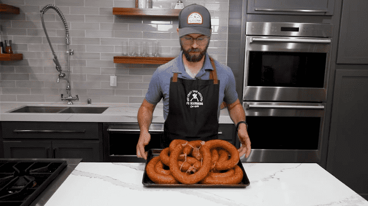 Image of Place the sausage in the fridge to cool completely overnight.