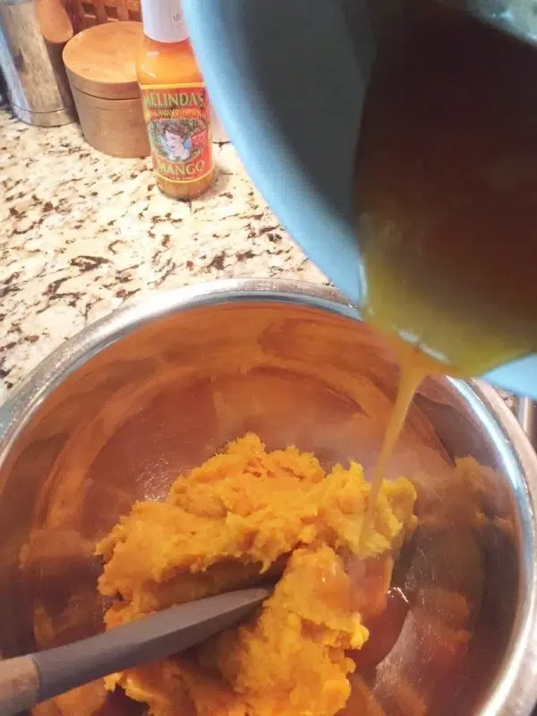 Image of Fold the glaze/sauce into the mashed squash, thoroughly incorporating the...