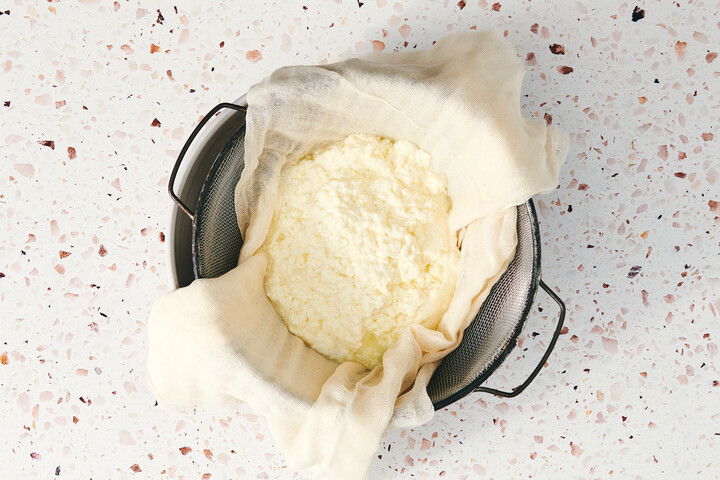 Recipe step 4: LET the curds stand until excess liquid has dra...