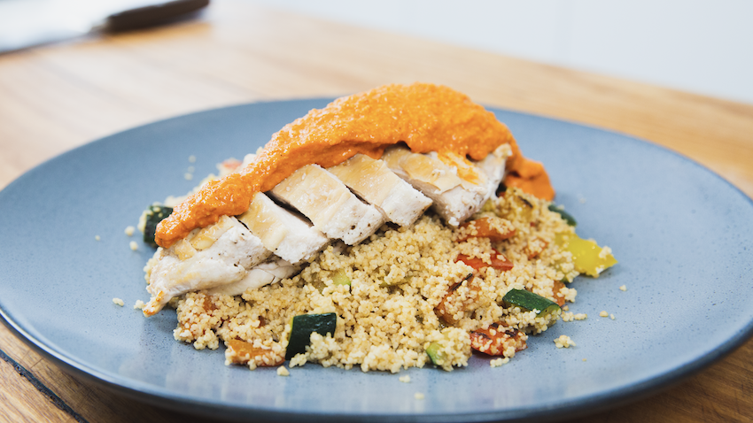 Image of Pan-roasted chicken breast, couscous salad and romesco