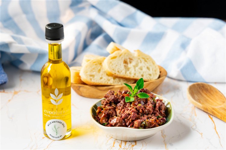 Image of Transfer the tapenade to a dish and serve with crostini...