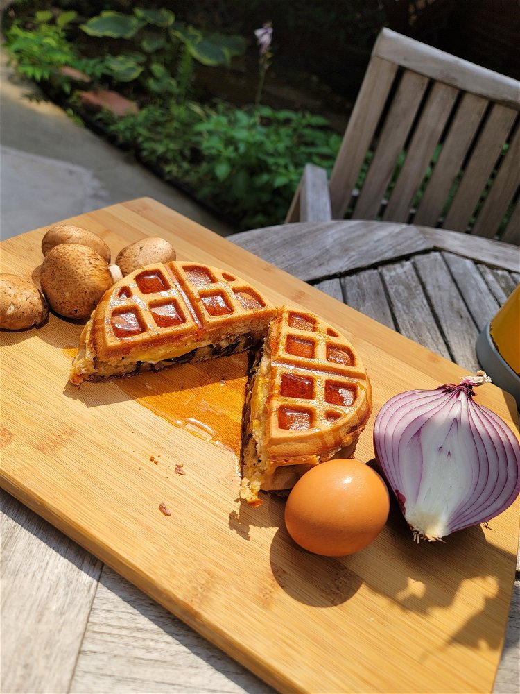 Image of Serve the Mushroom, Onion, Egg, and Cheese waffle warm and...