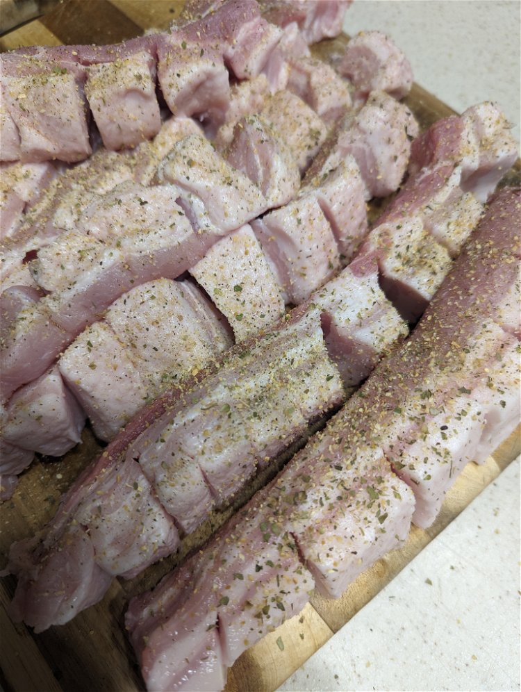 Image of Cut pork belly into one-inch-thick strips. Then cut three quarters...
