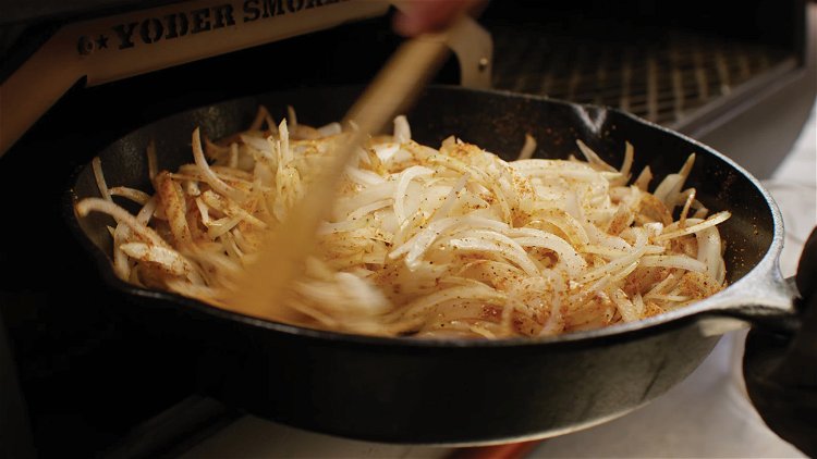 Image of Place your thin sliced onions in a Lodge 12” Cast...