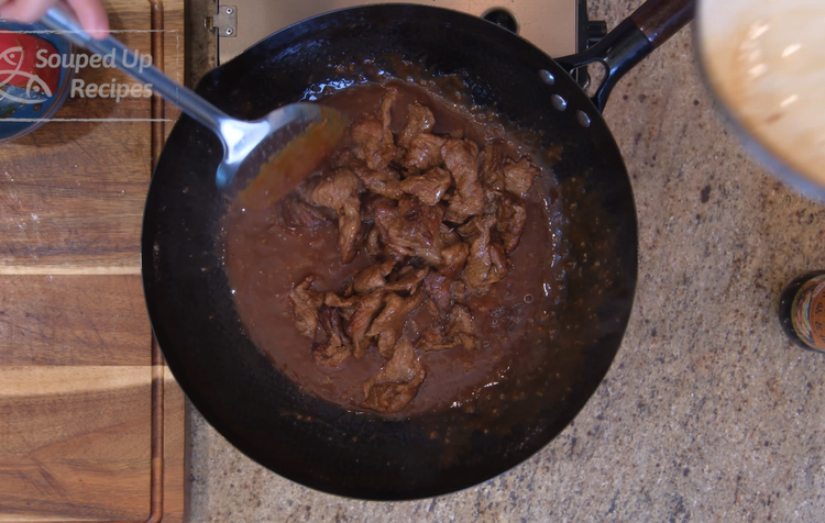 Image of Introduce the beef back into the wok and mix well. Set it aside. This satay beef is very flavorful so you have to serve it with a plain foundation.