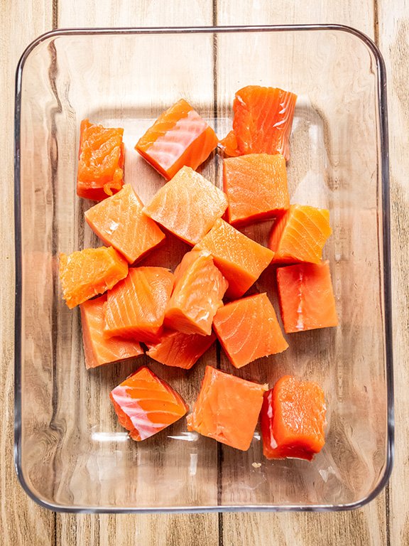 Image of Slice salmon into cubes and remove skin. Add to a...