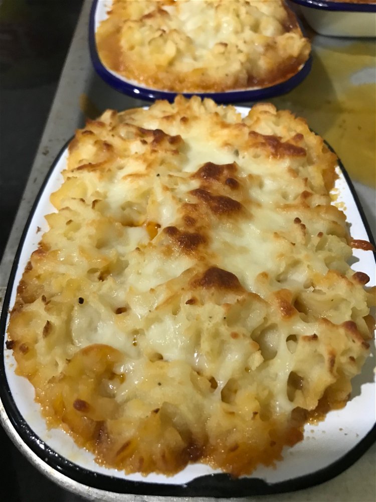 Image of Pipe mash potatoes on top of filling. Sprinkle with cheese...